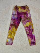 Load image into Gallery viewer, vintage ice-dyed sweatpants featuring a blend of deep magenta, golden yellow, and hints of white, creating a marbled effect. The ice dye technique produces organic, abstract patterns with soft color transitions. The pants have an elastic waistband and a slim fit.
