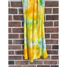 Load image into Gallery viewer, lose up of Antique 1930s yellow and orange ice-dyed cotton slip dress with lace trim, hanging against a red brick wall.