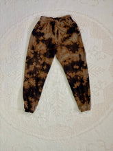 Load image into Gallery viewer, Vintage bleach-dyed sweatpants with a black and brown marbled pattern, elastic waistband, drawstring, and cuffed ankles