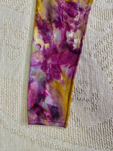 Load image into Gallery viewer, vintage ice-dyed sweatpants featuring a blend of deep magenta, golden yellow, and hints of white, creating a marbled effect. The ice dye technique produces organic, abstract patterns with soft color transitions. The pants have an elastic waistband and a slim fit.