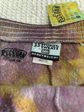 Load image into Gallery viewer, vintage ice-dyed sweatpants featuring a blend of deep magenta, golden yellow, and hints of white, creating a marbled effect. The ice dye technique produces organic, abstract patterns with soft color transitions. The pants have an elastic waistband and a slim fit.
