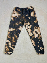 Load image into Gallery viewer, Reverse tie-dyed vintage sweatpants with drawstring waist and pockets, expertly hand-dyed for a unique, upcycled look. Good condition with no flaws
