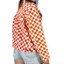 Load image into Gallery viewer, Side and back of a hand painted orange and white checkered jacket. 
