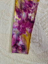 Load image into Gallery viewer, vintage ice-dyed sweatpants featuring a blend of deep magenta, golden yellow, and hints of white, creating a marbled effect. The ice dye technique produces organic, abstract patterns with soft color transitions. The pants have an elastic waistband and a slim fit.
