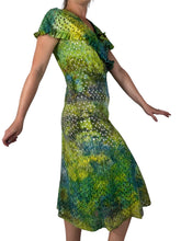 Load image into Gallery viewer, Side view of a Hand dyed 1930s antique cotton eyelet dress in blue and green. 
